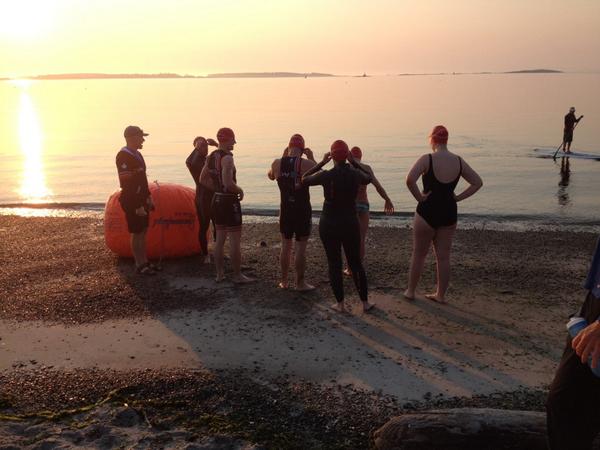 Athletes standing at waters edge for the first wave of the first ever Eliminator Triathlon