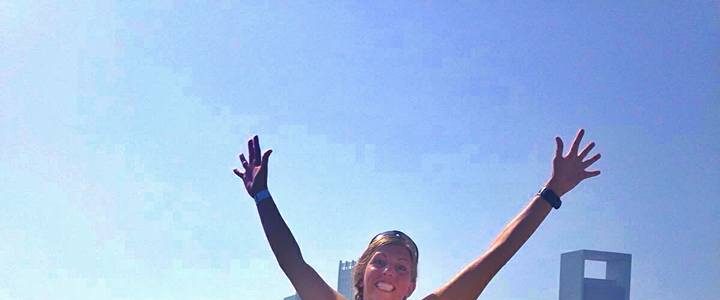 Kara Hobby jumping for joy at the Abu Dhabi ITU Triathlon Sprint race after finishing 15th overall