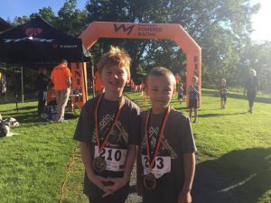 Torsten and Grayson at the finish of the HPR Youth Triathlon West Shore