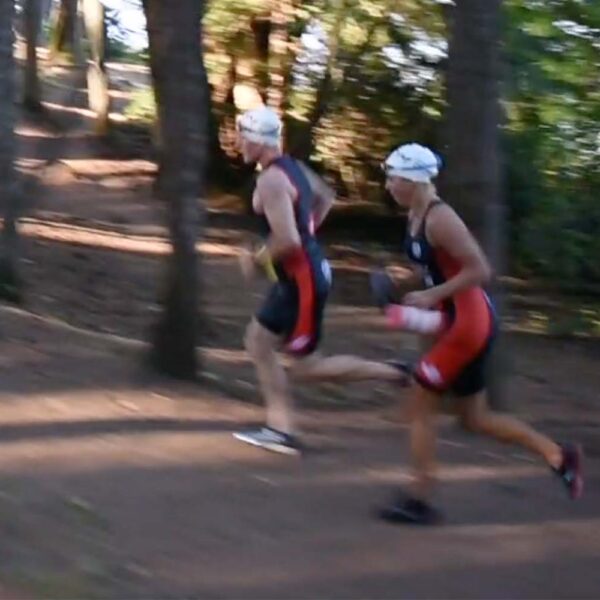 Runners charge up a hill while training for the Swimrun at Thetis Lake.