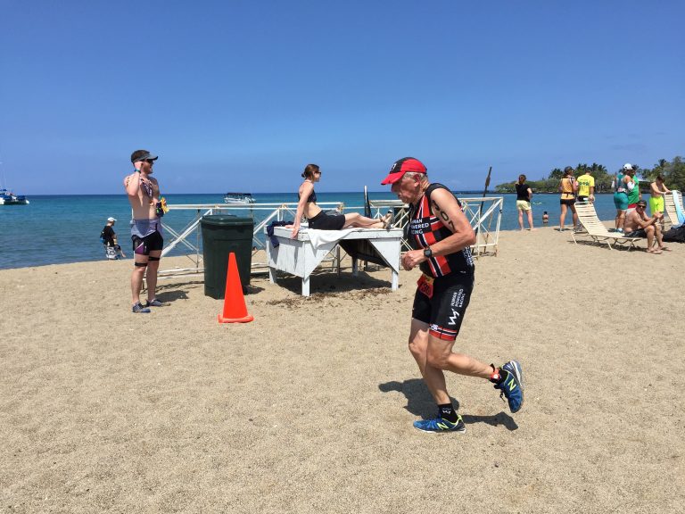 Justin Martin Running along A Bay on the Big Island of Hawaii during Lavaman Triathlon