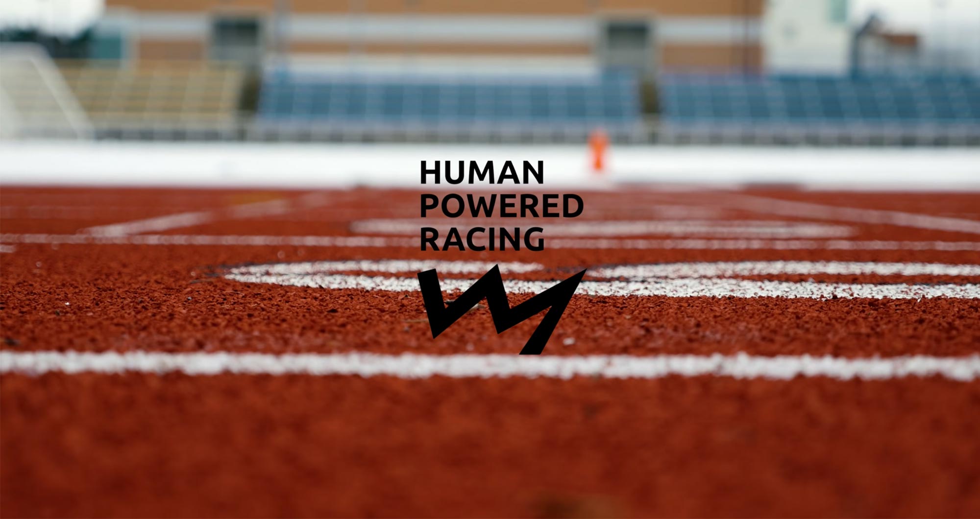 The Human Powered Racing logo floats over the UVic track.