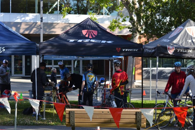 Cyclists get their bicycles tuned at the TREK Pro City tent.