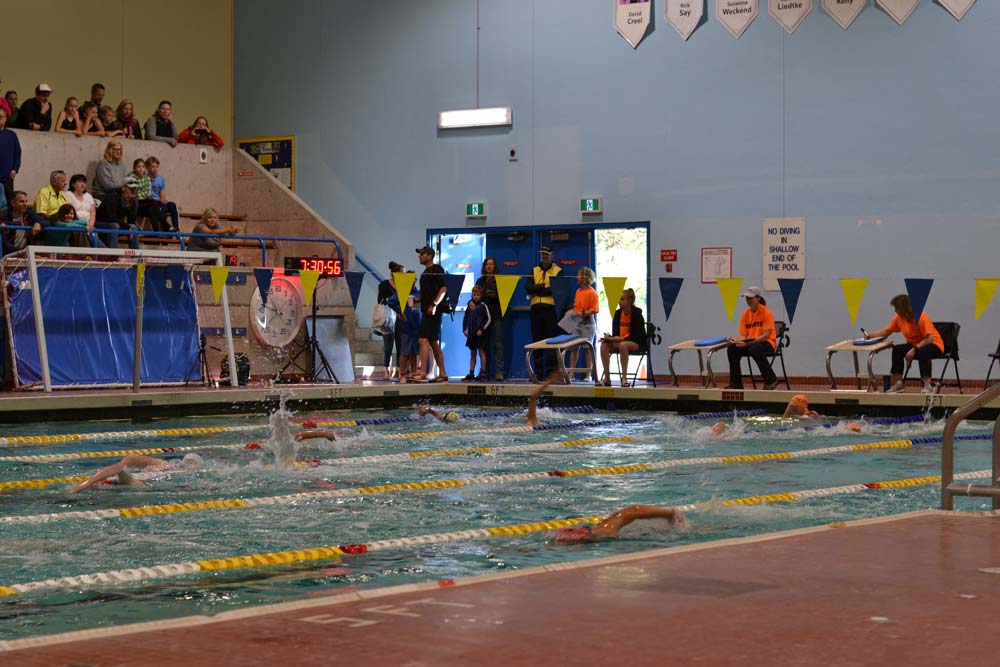 The first swim heat at the Victoria Youth Triathlon at McKinnon gym.