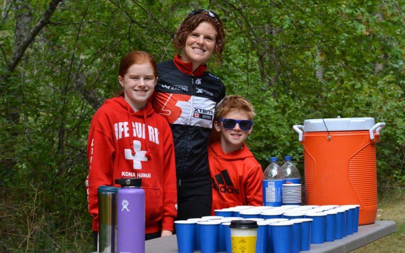 Colette Hopkins and kids volunteering their time at XTERRA Trail Run