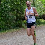 Nick Walker from Frontrunners finishes his first lap of the Victoria XTERRA Trail Run.