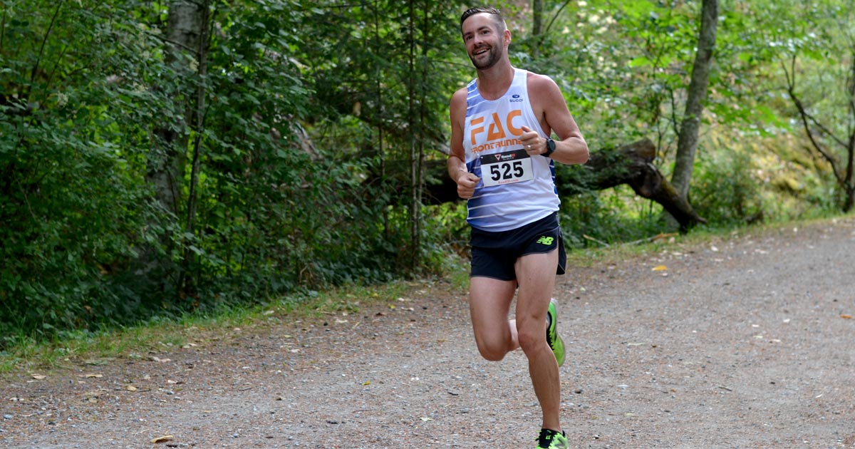 Nick Walker from Frontrunners finishes his first lap of the Victoria XTERRA Trail Run.