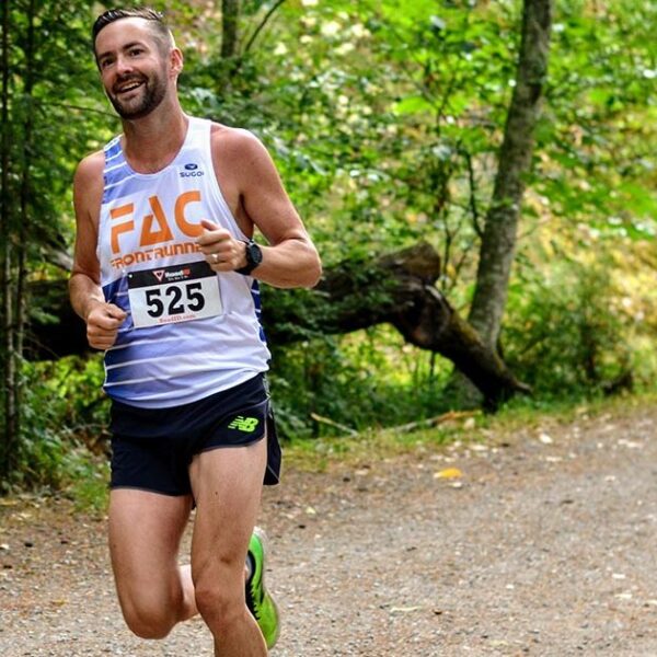XTERRA trail runner sprints to the finish line.