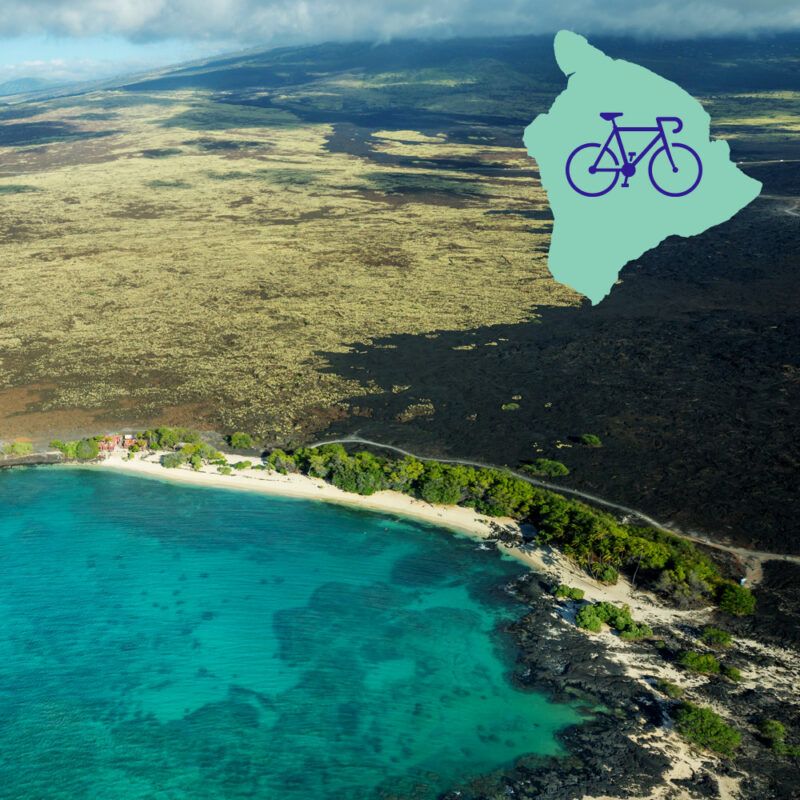 Big Island of Hawaii as seen from the air, with cobalt blue waters.
