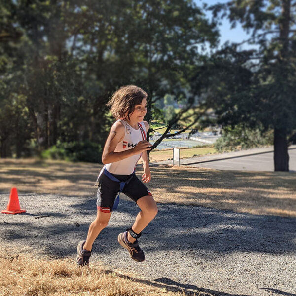 A young racer charges through the first lap of their run.