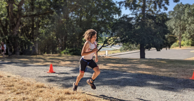 A young racer charges through the first lap of their run.