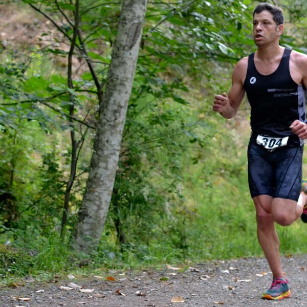 First place finisher, Barret, runs on his second lap around the lake.