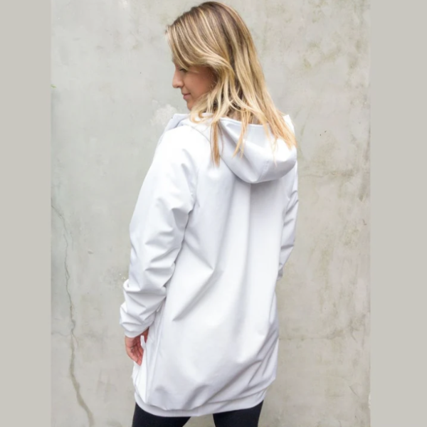 A blonde woman wearing a white swim parka